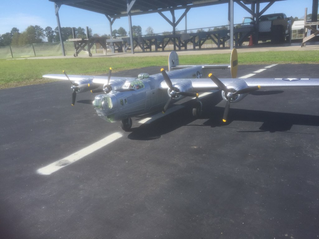 Giant scale four engine bomber under the shelter